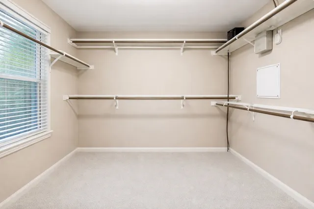 a view of an empty walk in closet
