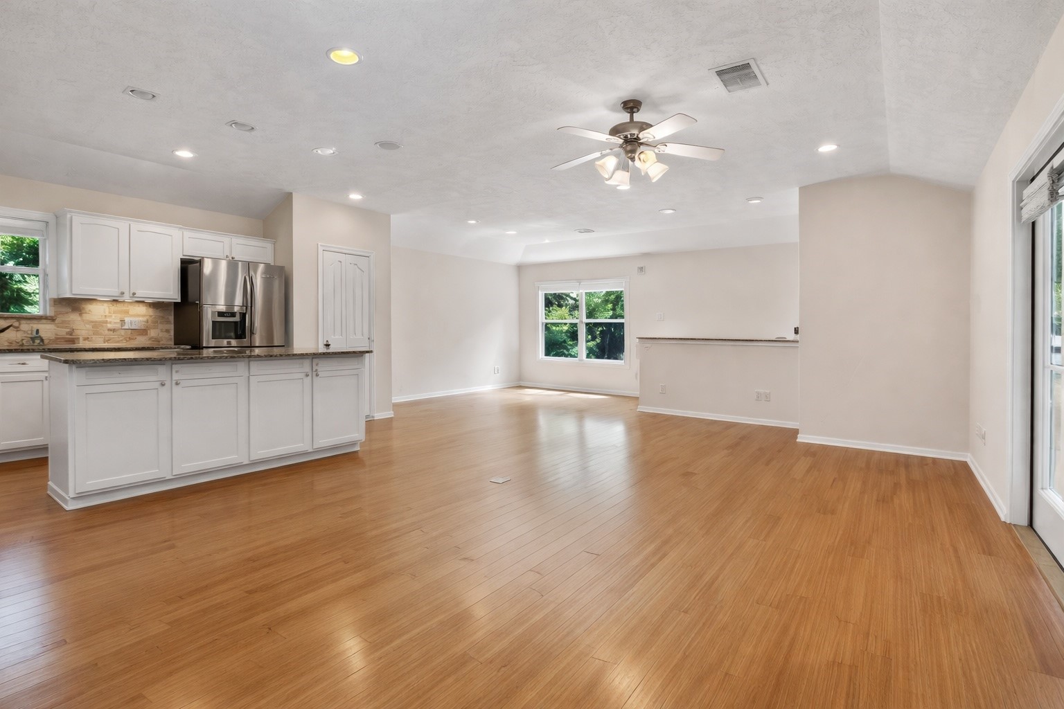 603 Granberry Street Humble, TX 77338 - Photo 5 of 16 a view of a kitchen with microwave and cabinets