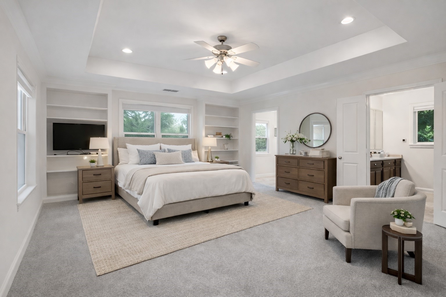 603 Granberry Street Humble, TX 77338 - Photo 7 of 16 a bedroom with a large bed and a chandelier