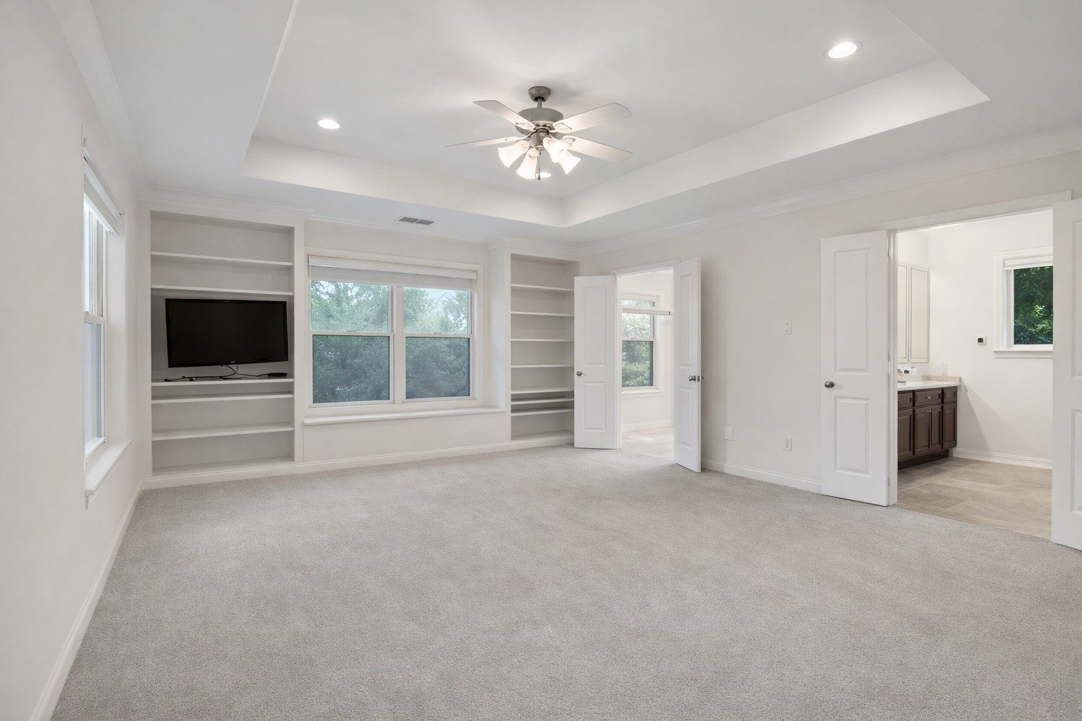 603 Granberry Street Humble, TX 77338 - Photo 8 of 16 a view of an empty room with a fireplace and a window