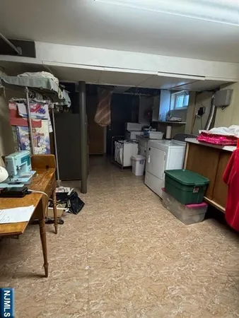 a room with furniture and a flat screen tv