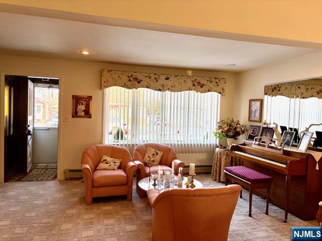 6 Patton Street Lodi, NJ 07644 - Photo 3 of 13 a living room with furniture and a large window