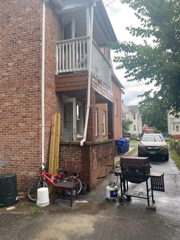 91-93 Grover Street Springfield, MA 01104 - Photo 12 of 12 a view of a patio with a table and chairs