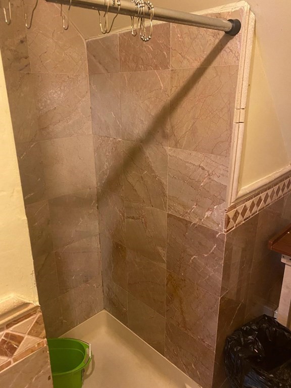 91-93 Grover Street Springfield, MA 01104 - Photo 7 of 12 a bathroom with a shower