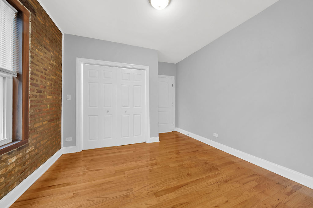 2256 West Arthur Avenue, Unit 2 Chicago, IL 60645 - Photo 13 of 18 a view of an empty room