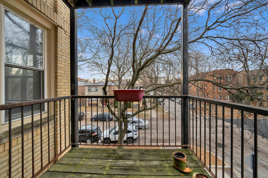 2256 West Arthur Avenue, Unit 2 Chicago, IL 60645 - Photo 14 of 18 a view of a house with a large window