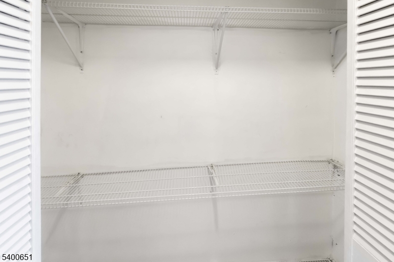 592 Summer Avenue Newark, NJ 07104 - Photo 10 of 16 a close view of closet