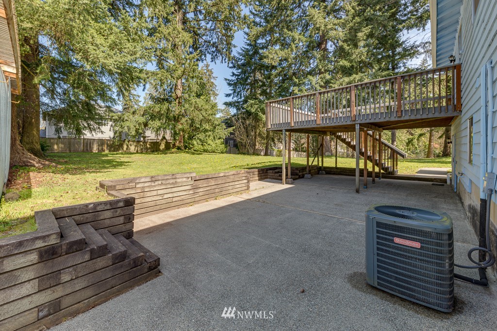 20105 8th Drive Southeast Bothell, WA 98012 - Photo 22 of 36 a view of a roof deck with wooden floor and fence