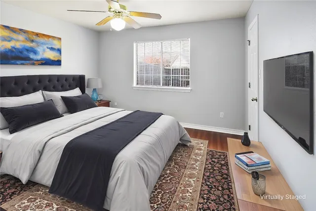 a bed room with a bed and a window