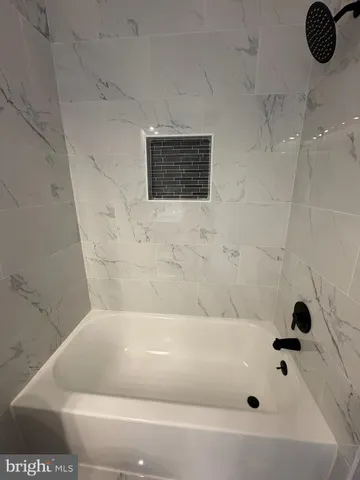 a bathroom with a bathtub