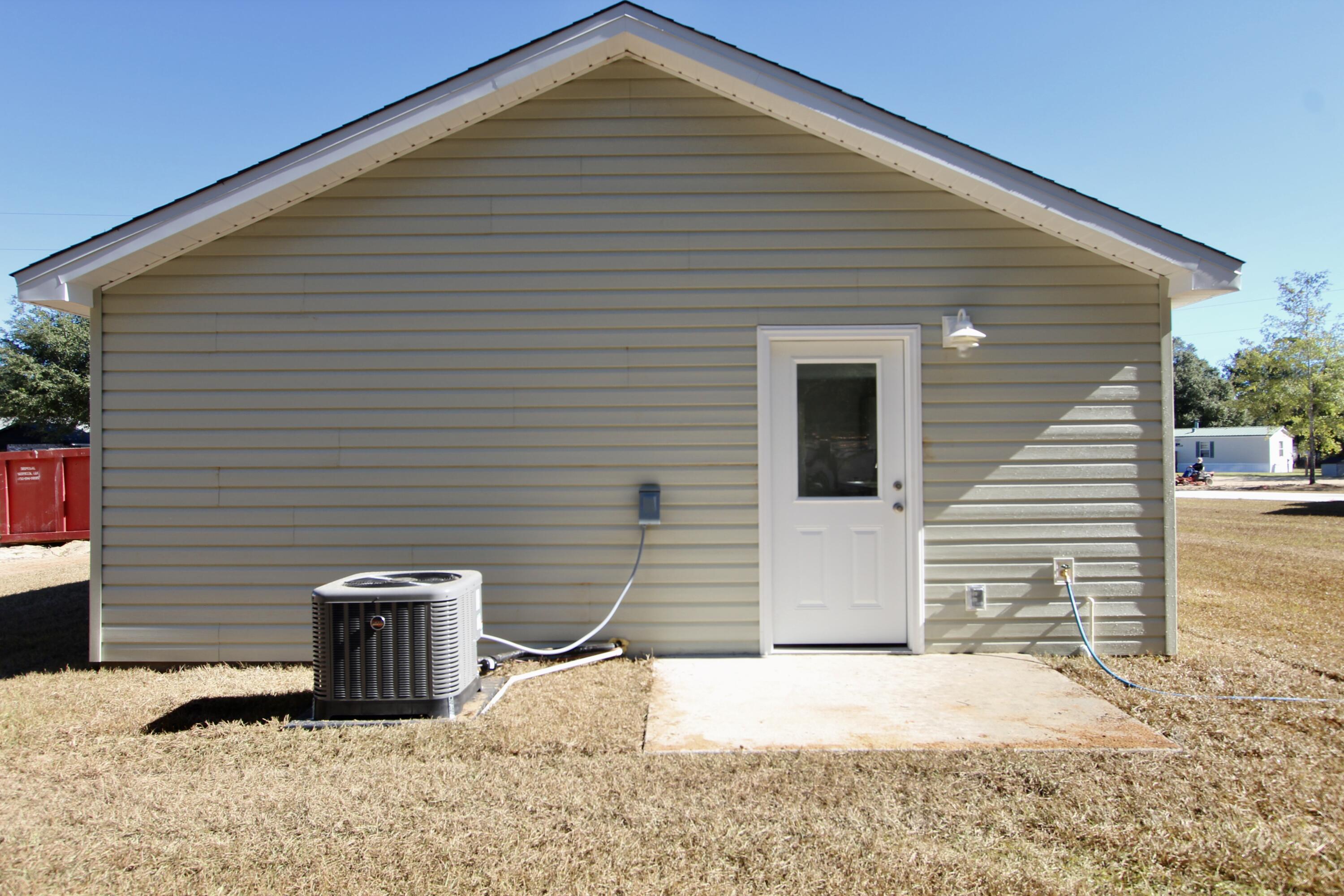 4662 Falcon Way Crestview, FL 32539 - Photo 19 of 20 a view of a patio with a chairs and table in the patio