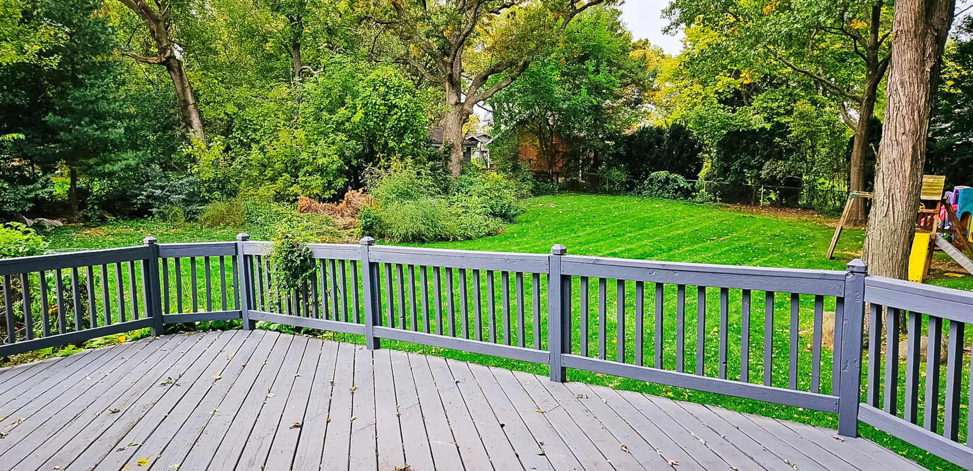 1808 May Drive Johnsburg, IL 60051 - Photo 12 of 32 a view of balcony with wooden floor and fence