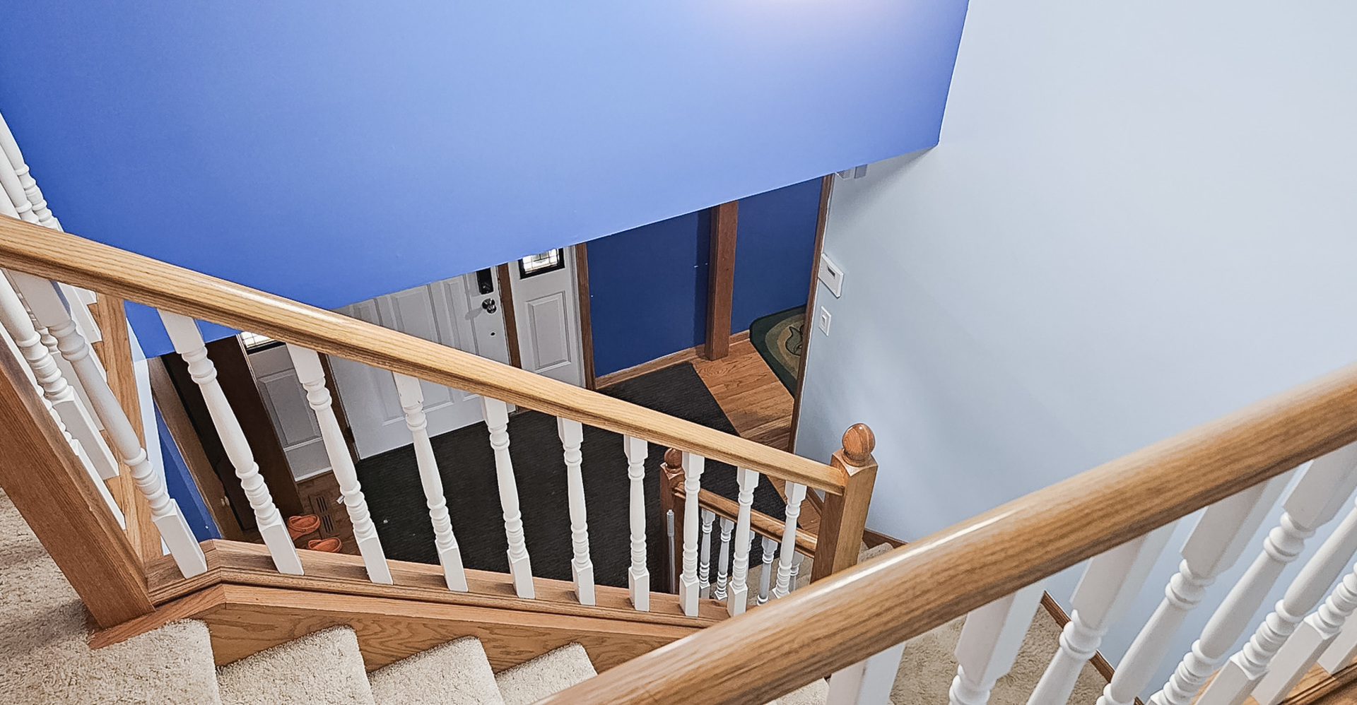 1808 May Drive Johnsburg, IL 60051 - Photo 17 of 32 a view of staircase with railing and white walls