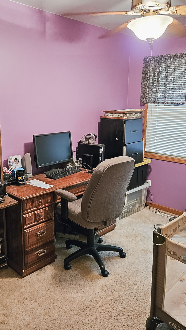 1808 May Drive Johnsburg, IL 60051 - Photo 22 of 32 a room with furniture and flat screen tv