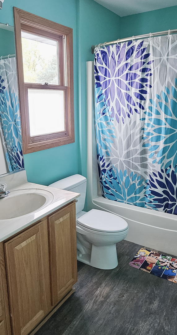 1808 May Drive Johnsburg, IL 60051 - Photo 25 of 32 a bathroom with a sink toilet and shower