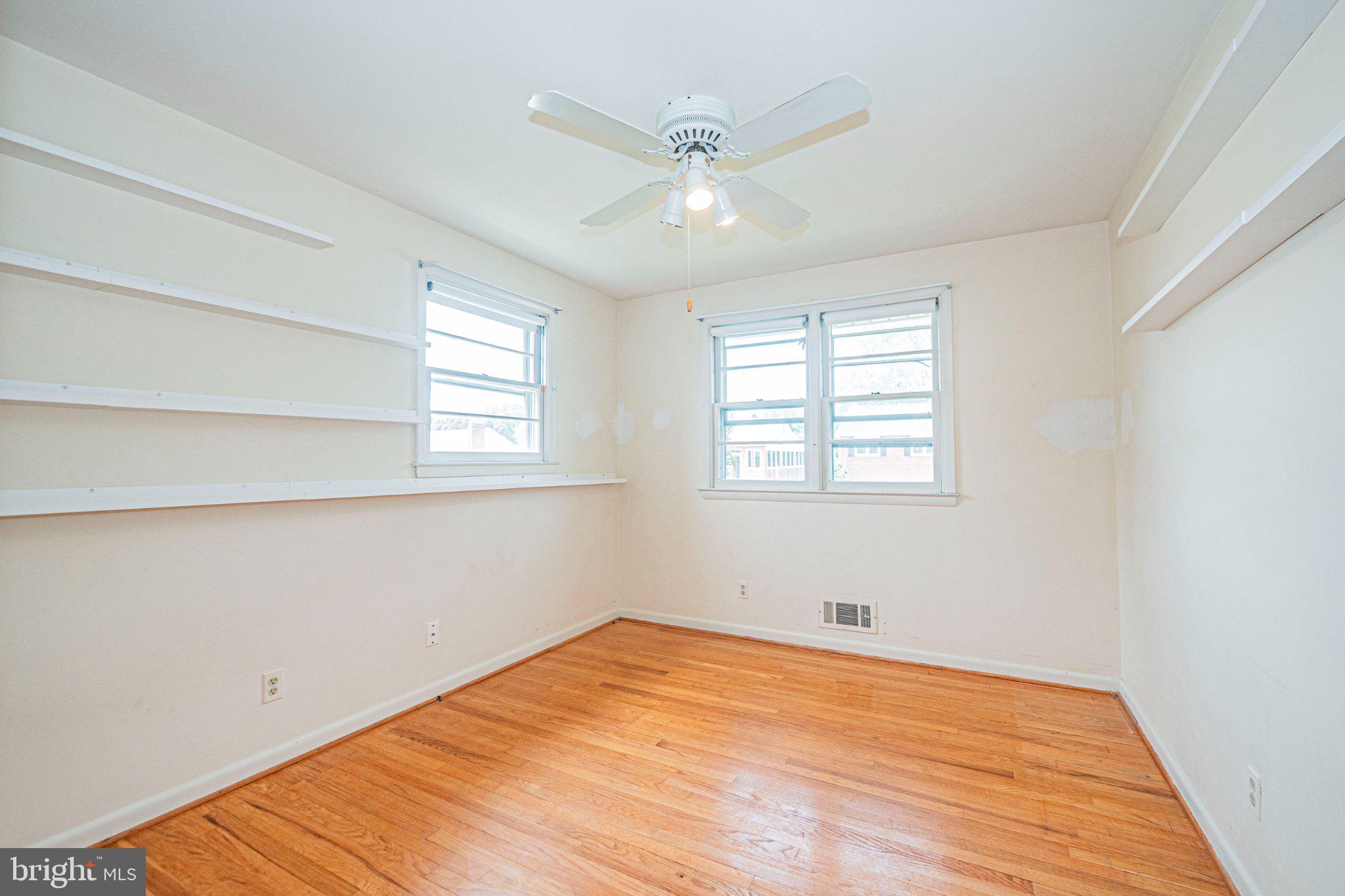 9907 Forge Park Road Perry Hall, MD 21128 - Photo 23 of 36 Bright and airy room with wood floors.