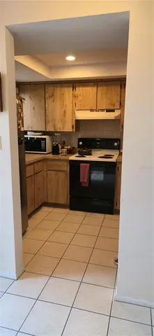 a bathroom with a toilet a sink and shower