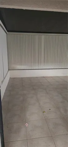 a view of a room with an empty space