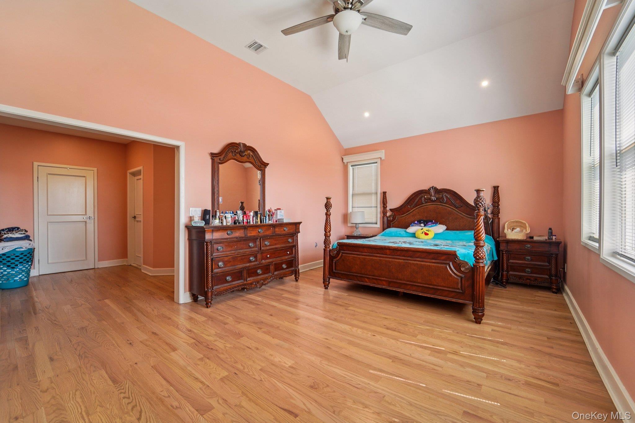 109 Bennett Road Newburgh, NY 12550 - Photo 24 of 41 This room features a high cathedral ceiling, hardwood floors, fireplace and a vaulted ceiling with a ceiling fan.