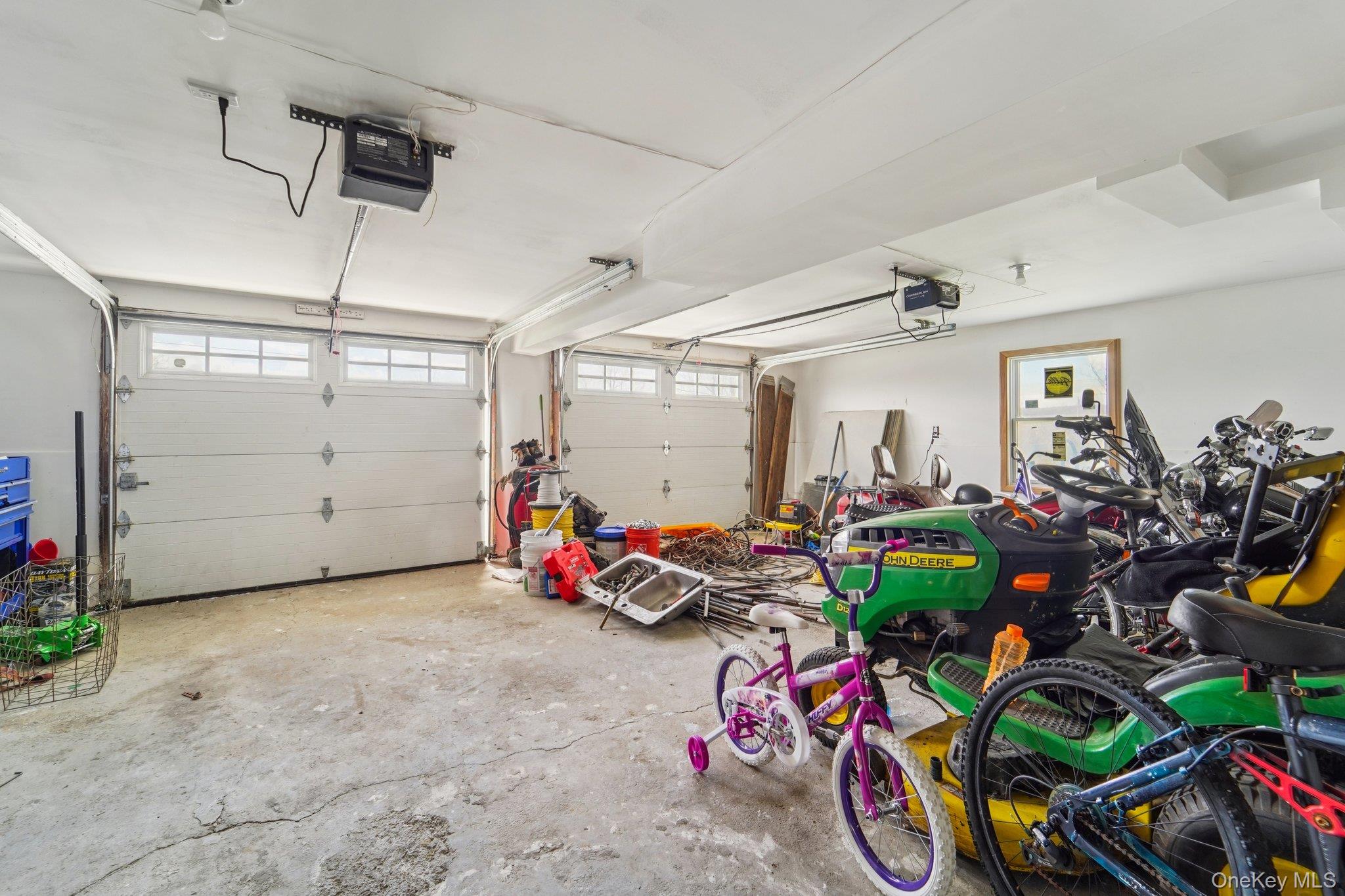 109 Bennett Road Newburgh, NY 12550 - Photo 34 of 41 The property features a two-door garage with overhead garage door openers.