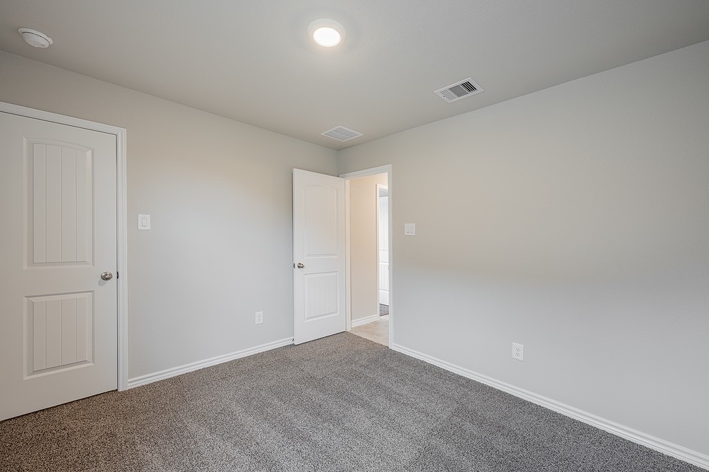 602 Davy Street Brenham, TX 77833 - Photo 11 of 16 a view of an empty room