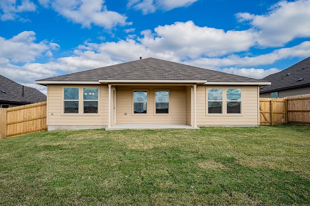 602 Davy Street Brenham, TX 77833 - Photo 15 of 16 a house view with a garden space