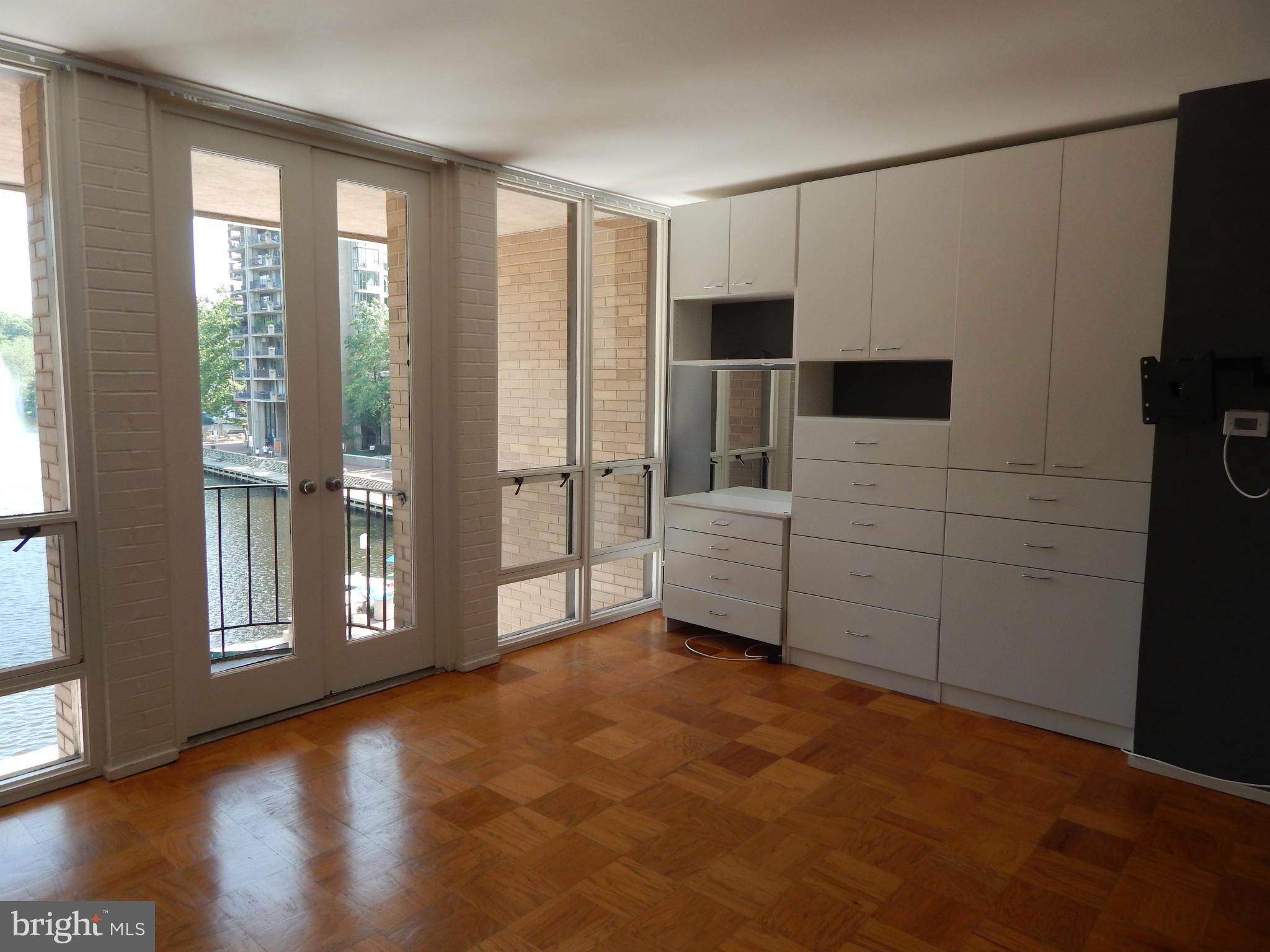 1620 Chimney House Road, Unit 1620 Reston, VA 20190 - Photo 11 of 16 a view of empty room with wooden floor and fan