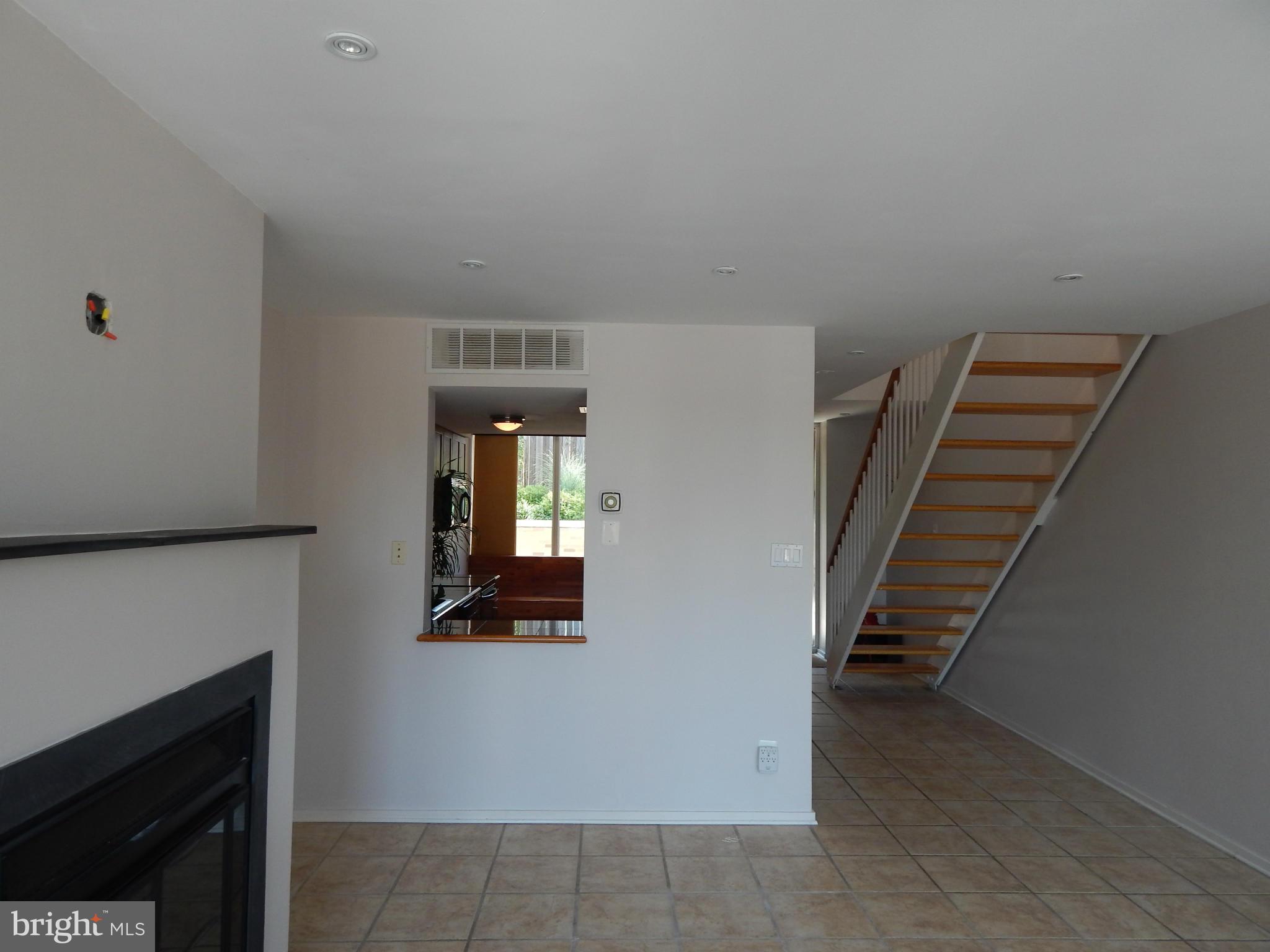 1620 Chimney House Road, Unit 1620 Reston, VA 20190 - Photo 3 of 16 a view of a hallway with staircase