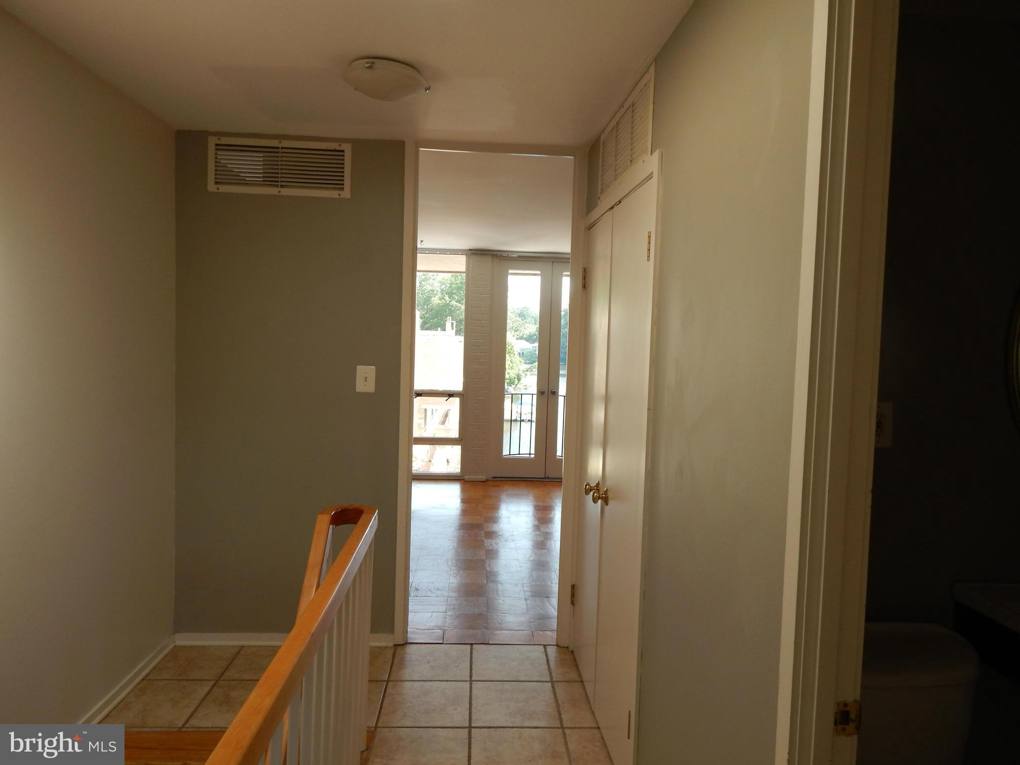 1620 Chimney House Road, Unit 1620 Reston, VA 20190 - Photo 4 of 16 a view of hallway with stairs