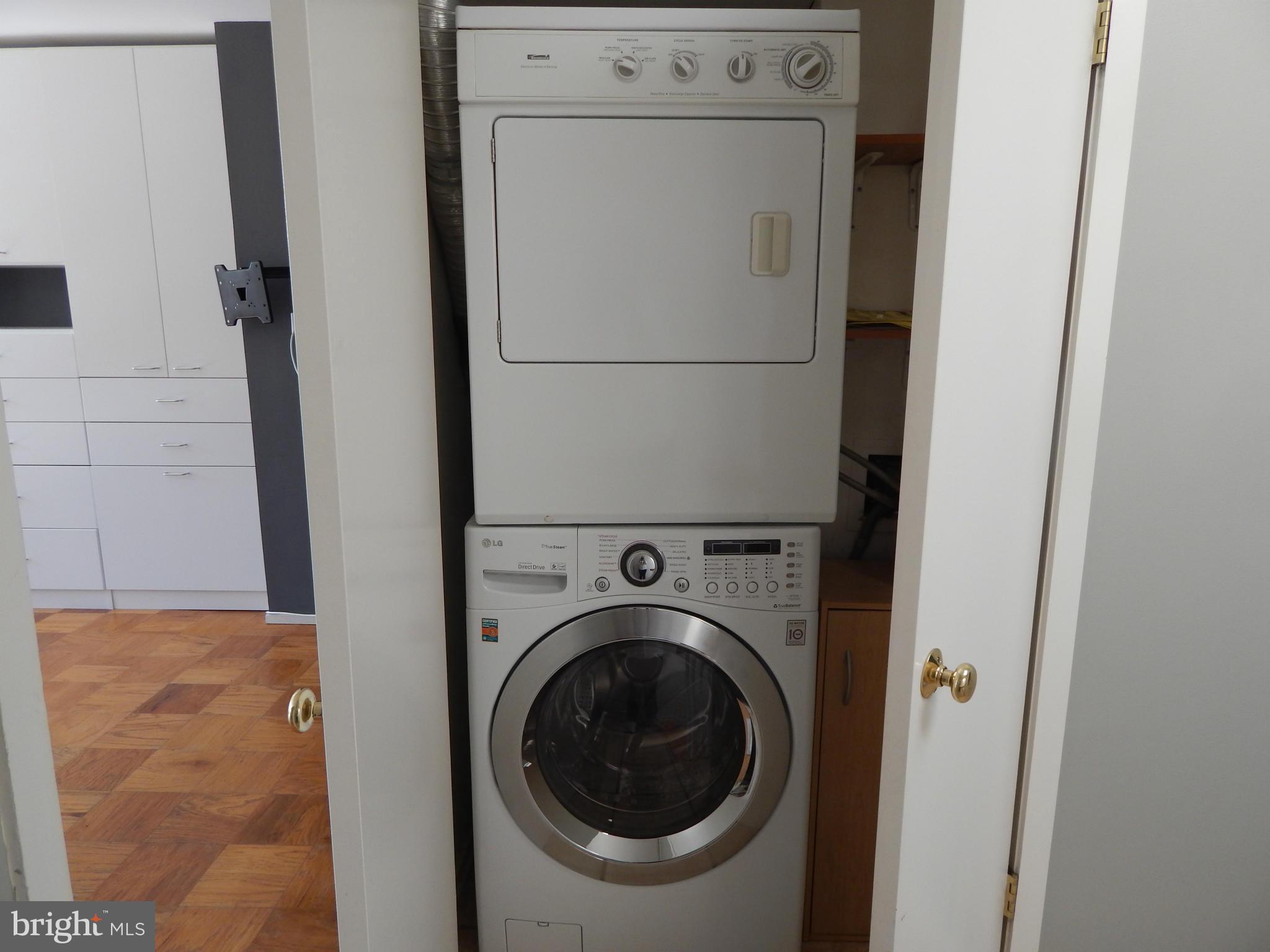 1620 Chimney House Road, Unit 1620 Reston, VA 20190 - Photo 10 of 16 a utility room with dryer and washer