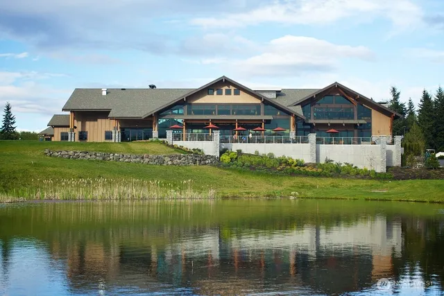 a house with river in front of it