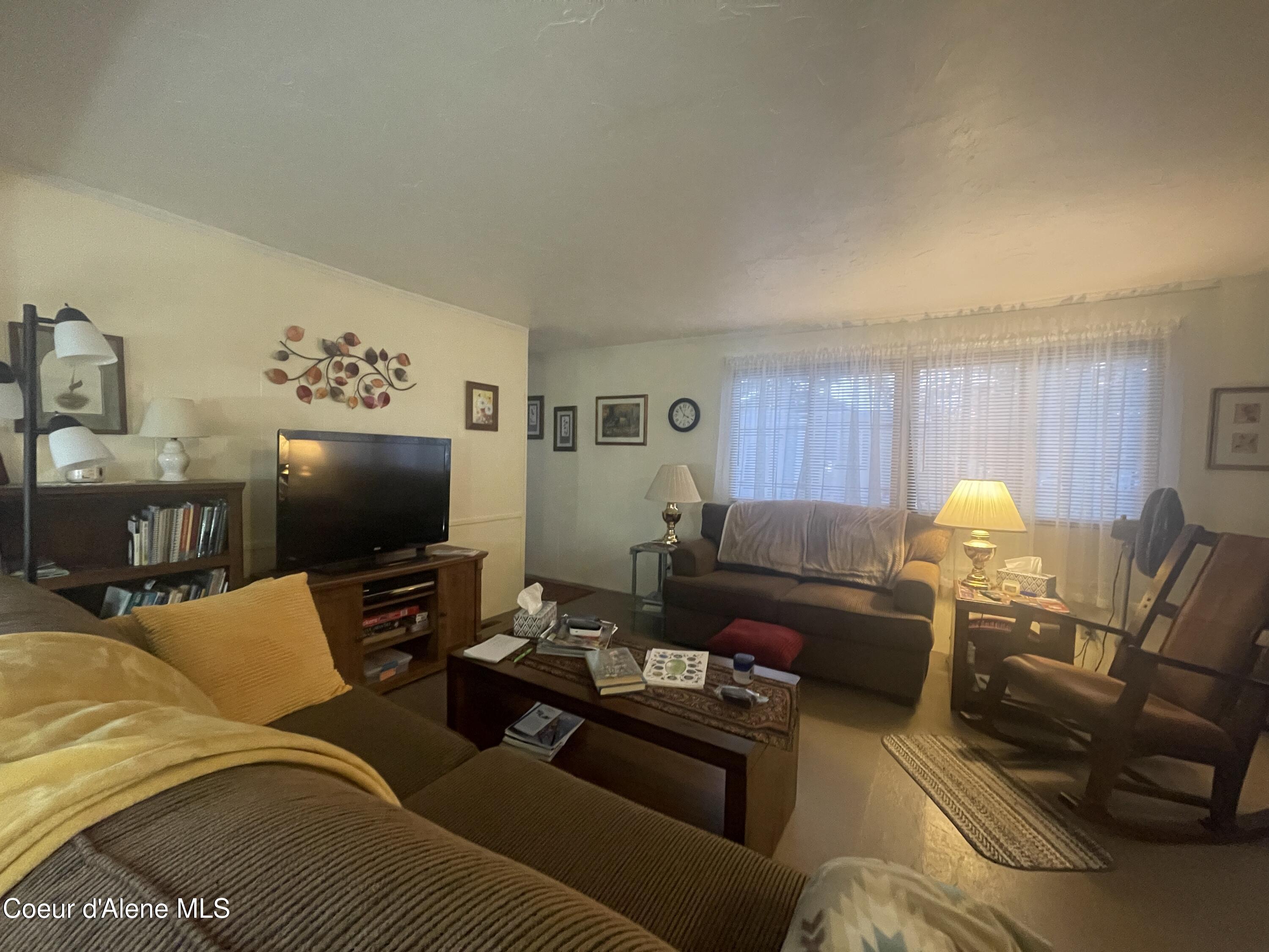 111 Gun Club Road, Unit 27 Sagle, ID 83860 - Photo 14 of 35 Living Room and extra space