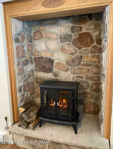 a living room with a fireplace