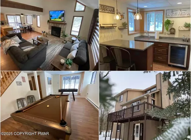 a view of living room kitchen with furniture and flat screen tv
