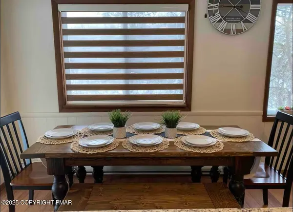 a view of a dining room with furniture