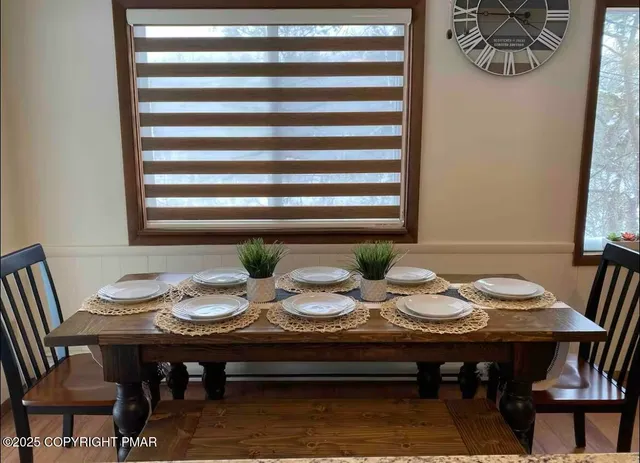 a view of a dining room with furniture