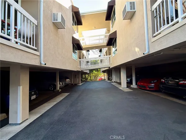 a view of a street with cars