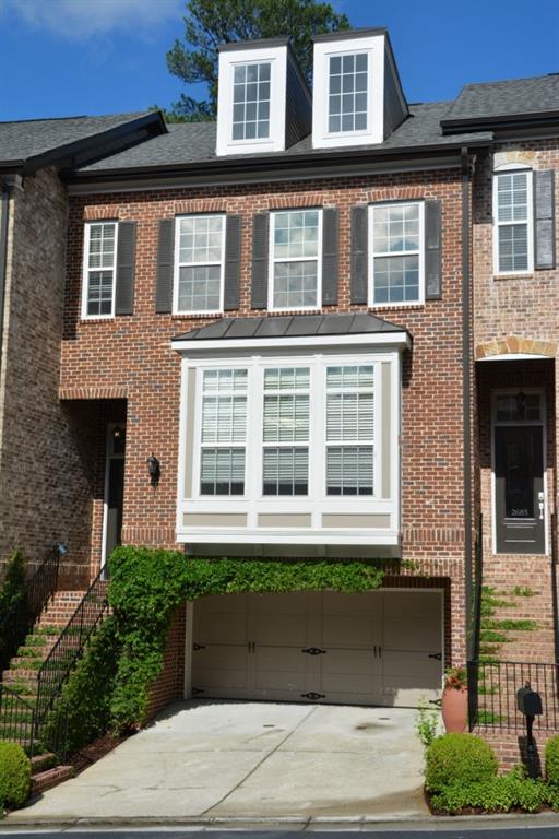 2687 Rivers Edge Drive Northeast, Unit 2687 Atlanta, GA 30324 - Photo 1 of 1 Handsome Brick Townhome, With Dormer Windows on Attic, Totally Repainted Exterior in 2016.
