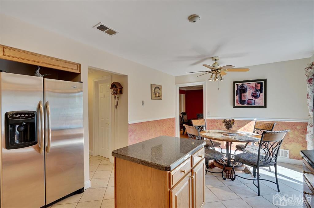 83 Amboy Road Old Bridge, NJ 07747 - Photo 11 of 40 a dining room with furniture and window