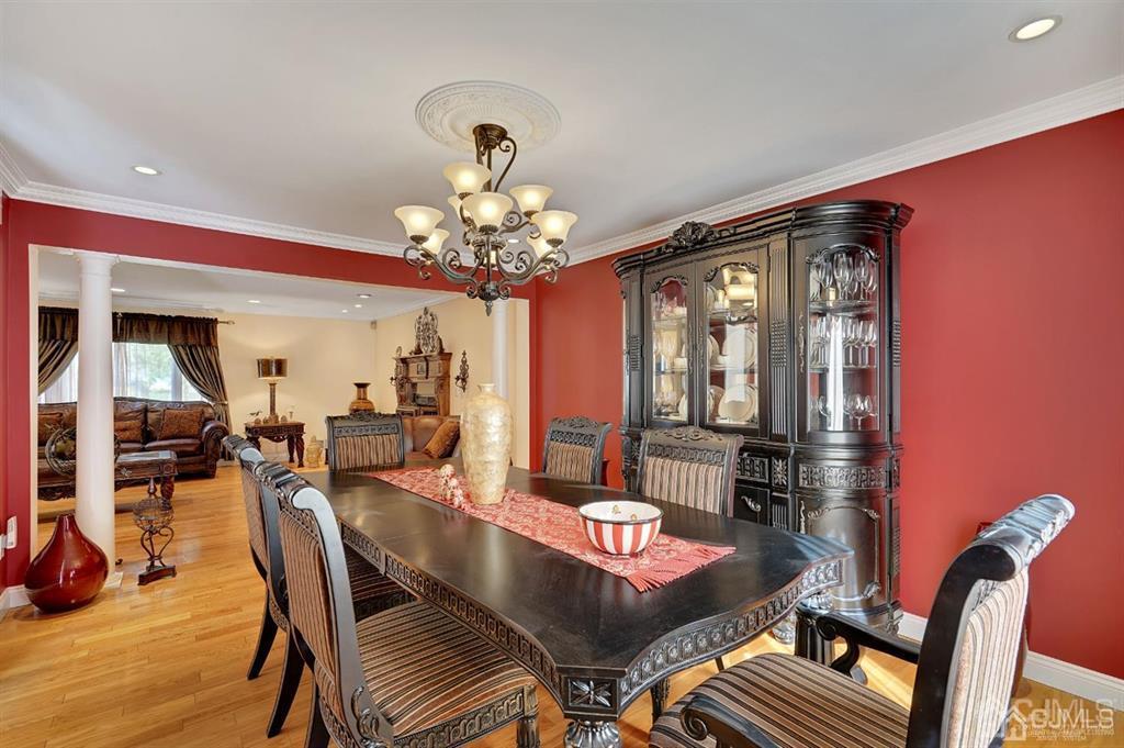 83 Amboy Road Old Bridge, NJ 07747 - Photo 7 of 40 a view of a dining room with furniture and chandelier