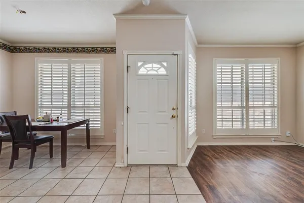 a view of a livingroom with furniture and window