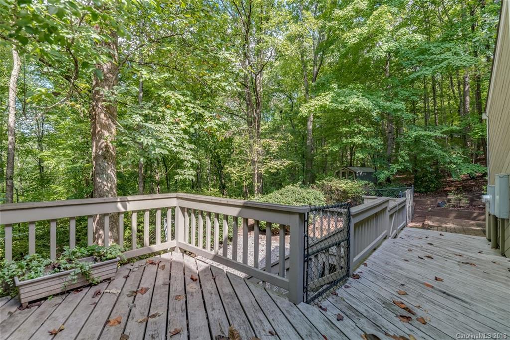 688 Laurel Ridge Road Columbus, NC 28722 - Photo 17 of 30 a view of balcony with wooden floor and fence