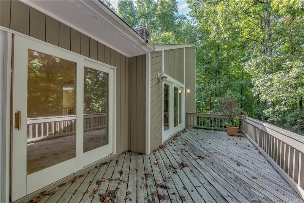 688 Laurel Ridge Road Columbus, NC 28722 - Photo 20 of 30 a view of a house with a porch