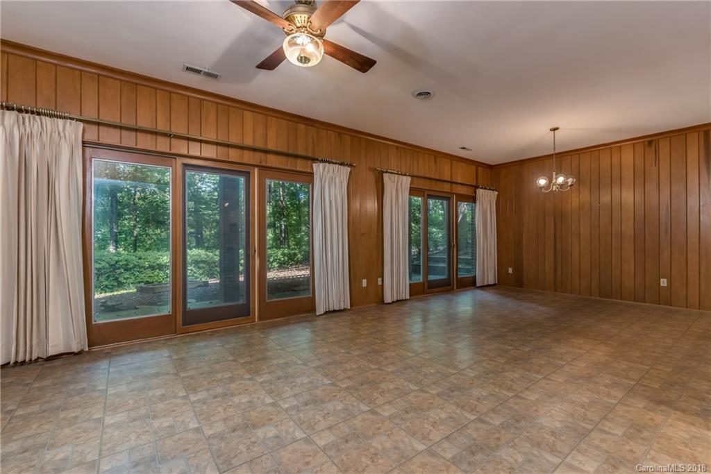 688 Laurel Ridge Road Columbus, NC 28722 - Photo 21 of 30 a view of an empty room with a window
