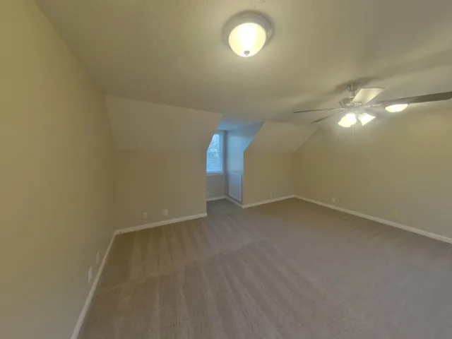 a view of a room with a fan