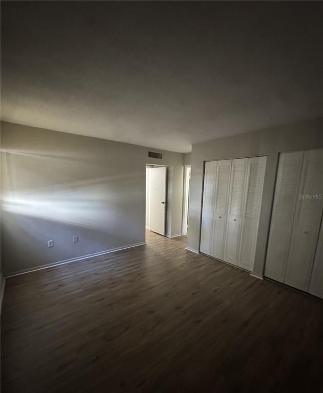 717 Southwest 75th Street, Unit 103 Gainesville, FL 32607 - Photo 10 of 13 a view of an empty room
