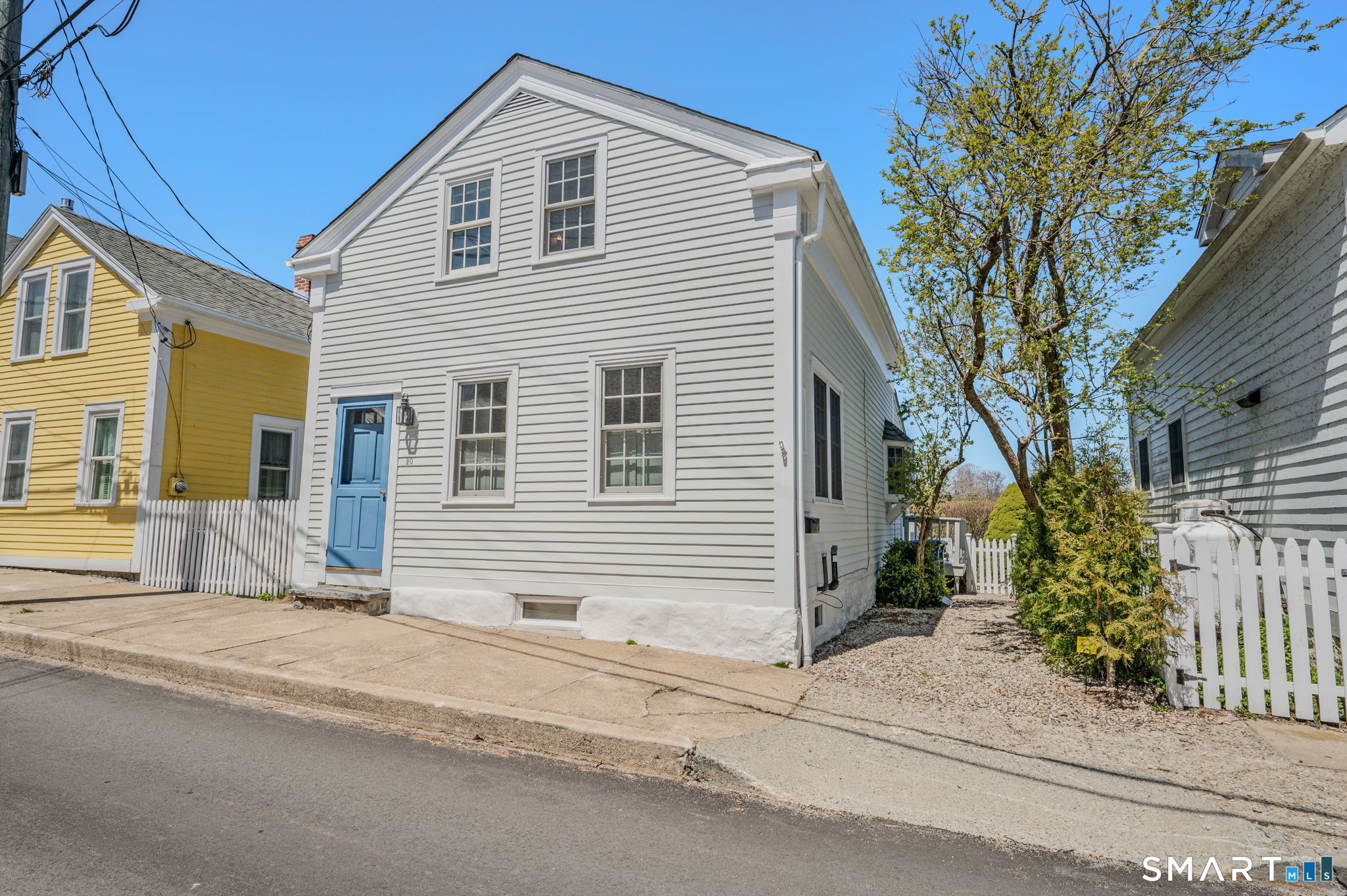 20 Diving Street Stonington, CT 06378 - Photo 1 of 33 a house with a outdoor space