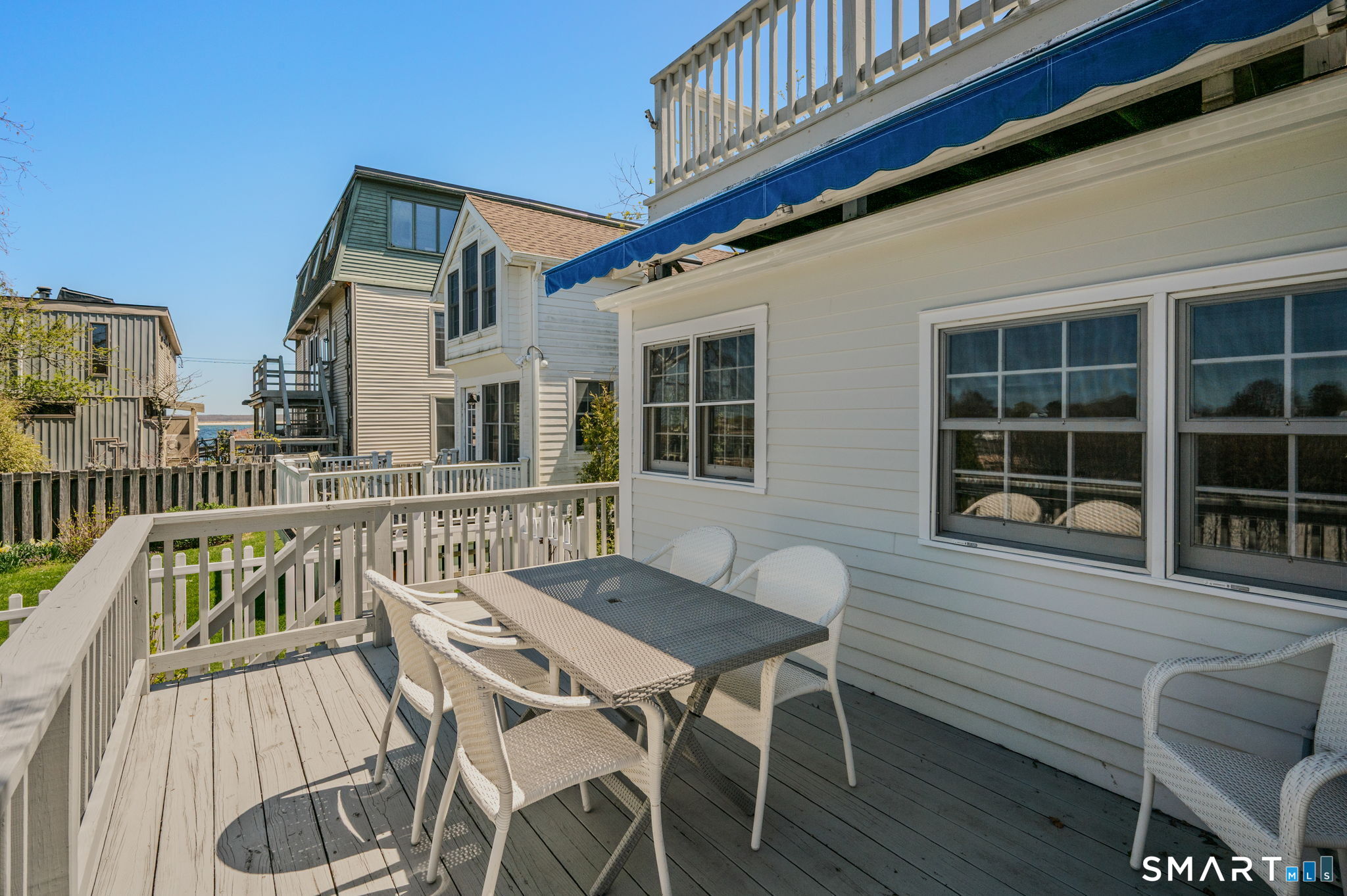 20 Diving Street Stonington, CT 06378 - Photo 16 of 33 a view of a chair and table in the balcony