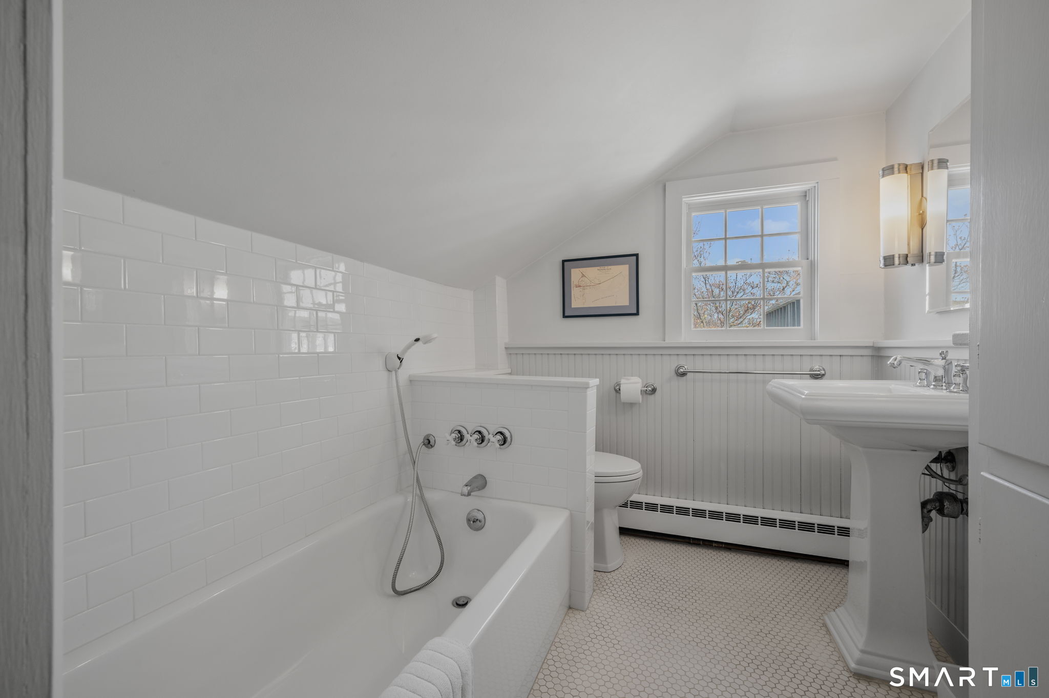 20 Diving Street Stonington, CT 06378 - Photo 20 of 33 a bathroom with a sink a bathtub and a shower