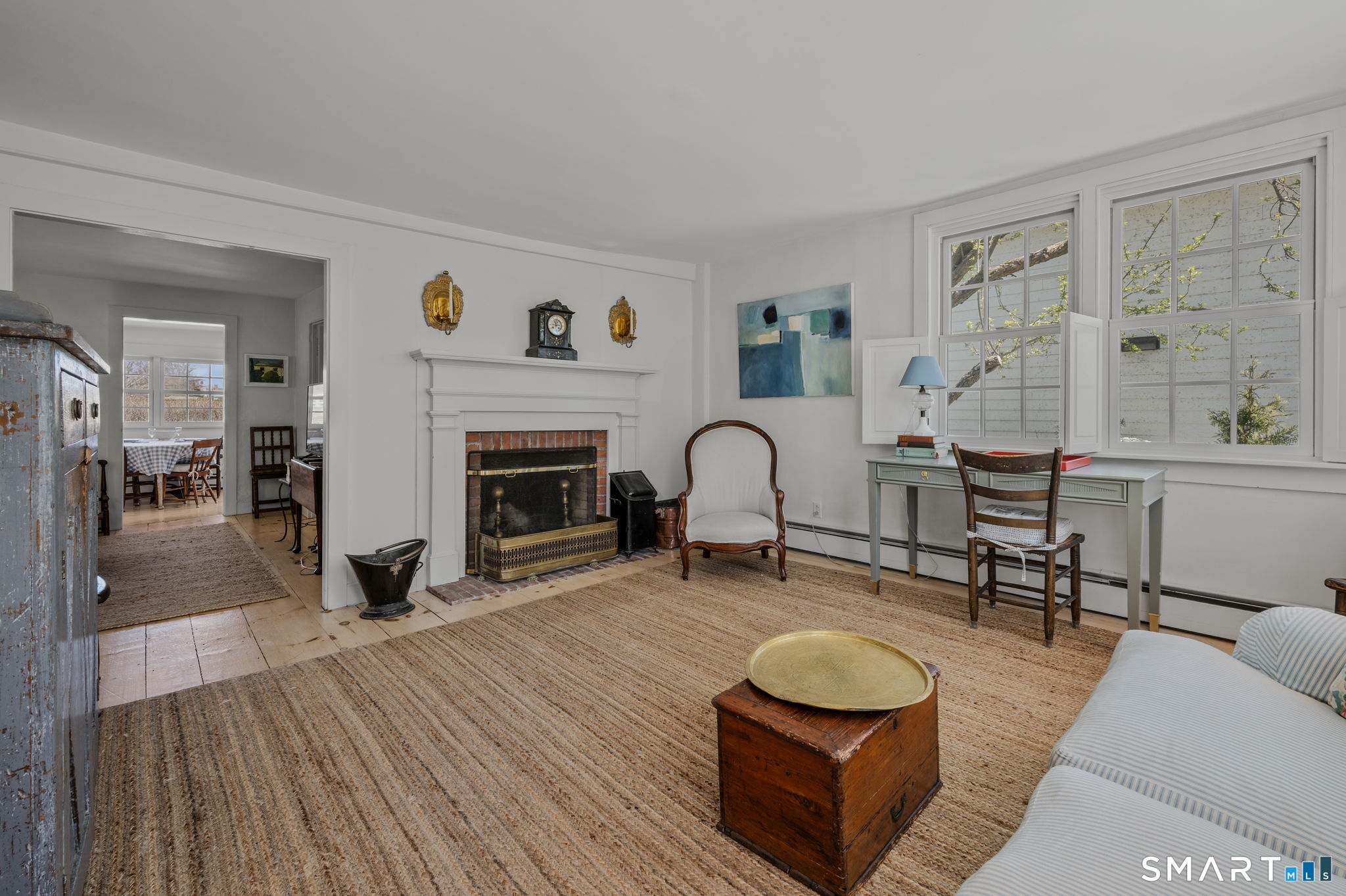 20 Diving Street Stonington, CT 06378 - Photo 2 of 33 a living room with furniture and a fireplace